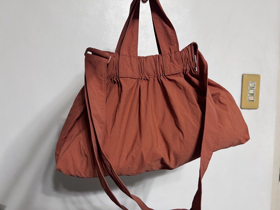 Beyond the Vine - Dumpling bag dual purposes (Category: Cross-body Bags) located in Quezon City. Submitted by lunamond (Listing ID 1469697998, Image 3). Description: Dual purpose bag , with hand-held and croo body strap. Tangerine in color functional wise is very good to manage.