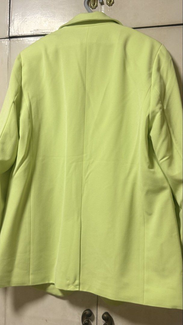 Bik Bok Lime Green Oversized Blazer (Category: Coats, Jackets and Outerwear) located in Makati City. Submitted by mbcab (Listing ID 1469686139, Image 3). Description: - Brand: Bik Bok - Model: OB Biggie - Bought in Sweden for Php 4,500 - Size: XS-S but this is a European brand so runs big (can fit up to large) - Condition: Brand new with tags (BNWT) - Color: Vibrant lime green - Design: Classic lapel collar, single button closure, and front flap 