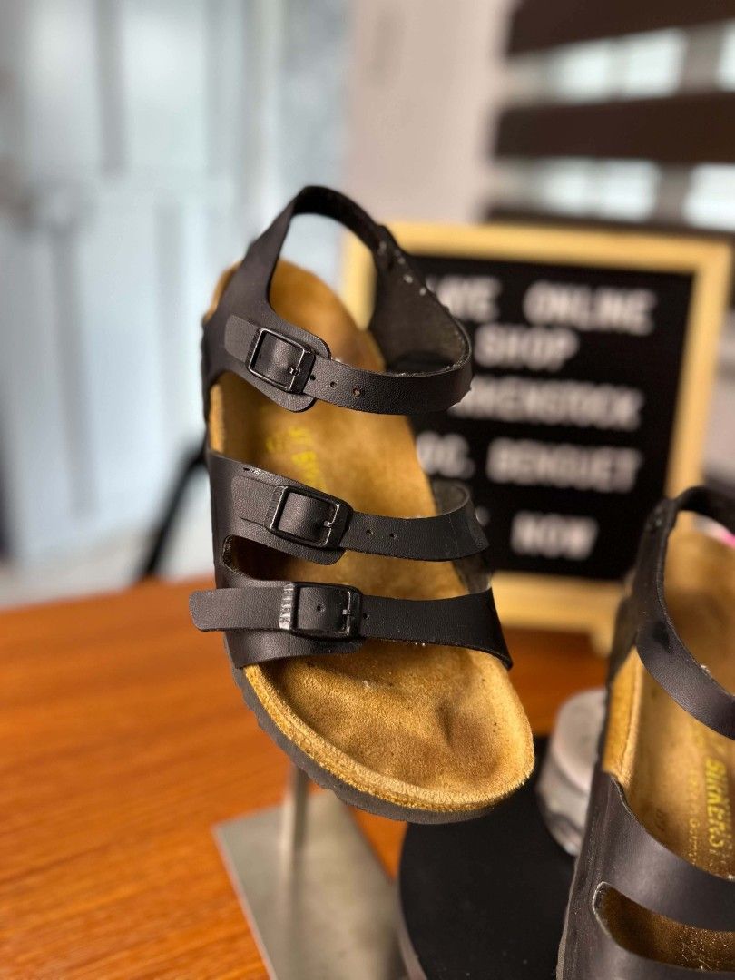 Birkenstock Athen Sandals (Category: Flats & Sandals) located in Baguio. Submitted by kayeonlineshop (Listing ID 1469616611, Image 2). Description: Birkenstock Athen black leather gladiator-style sandals with multiple buckle straps and a contoured cork footbed. color:black size:37.