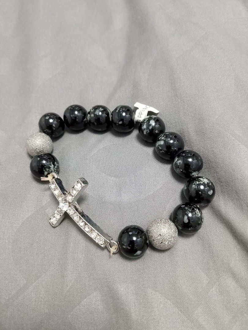 Black and Silver Beaded Cross Stretch Bracelet (Category: Bracelets) located in Manila. Submitted by batchi1019 (Listing ID 1469581978, Image 1). Description: - Design: Black and silver beaded stretch bracelet with sparkly textured beads and snowflake obsidian-style round beads - Accent: Large silver-tone cross charm encrusted with clear rhinestones - Fit: Easy slip-on stretch cord design fits most wrist sizes - Versatility: Great statement piece