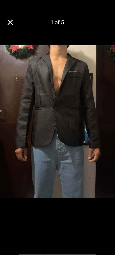 Black Casual Blazer Mens Jacket (Category: Coats, Jackets and Outerwear) located in Manila. Submitted by billythekid05 (Listing ID 1469719452, Image 1). Description: - Color: Black - Style: Casual single-button blazer - Features: Structured collar and lapels, front pocket with a white pocket square accent - Fabric: Lightweight and great for layering - Condition: Clean, worn only a few times - Ideal for: Smart-casual events and everyday layering.