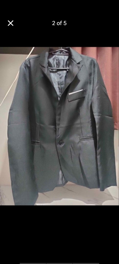 Black Casual Blazer Mens Jacket (Category: Coats, Jackets and Outerwear) located in Manila. Submitted by billythekid05 (Listing ID 1469719452, Image 2). Description: - Color: Black - Style: Casual single-button blazer - Features: Structured collar and lapels, front pocket with a white pocket square accent - Fabric: Lightweight and great for layering - Condition: Clean, worn only a few times - Ideal for: Smart-casual events and everyday layering.