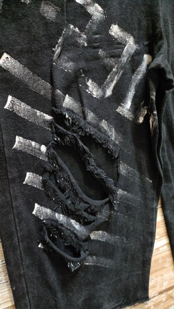 Black Distressed Denim Overalls With Painted Graphics (Category: Jumpsuits) located in Dasmarinas. Submitted by kheiko086 (Listing ID 1469617589, Image 2). Description: size W:36" L:36 from waist adj strap non stretch hard denim EUC LH:10 JNT Delivery Style: Edgy streetwear black denim overalls - Details: Heavy distressing, raw hems, and a sleeveless deep V-neck tank top with distressed straps.