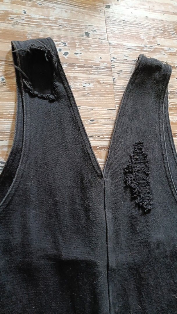 Black Distressed Denim Overalls With Painted Graphics (Category: Jumpsuits) located in Dasmarinas. Submitted by kheiko086 (Listing ID 1469617589, Image 3). Description: size W:36" L:36 from waist adj strap non stretch hard denim EUC LH:10 JNT Delivery Style: Edgy streetwear black denim overalls - Details: Heavy distressing, raw hems, and a sleeveless deep V-neck tank top with distressed straps.