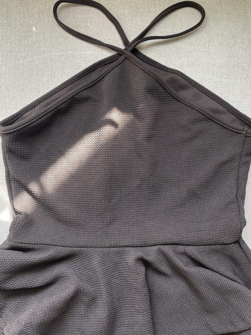 black halter neck peplum top (Category: Sleeveless) located in Manila. Submitted by happymoon_0ae0c8 (Listing ID 1469554497, Image 3). Description: - s - fitted bodice with flared peplum hem - textured material - rfs: too big on me - negotiable .