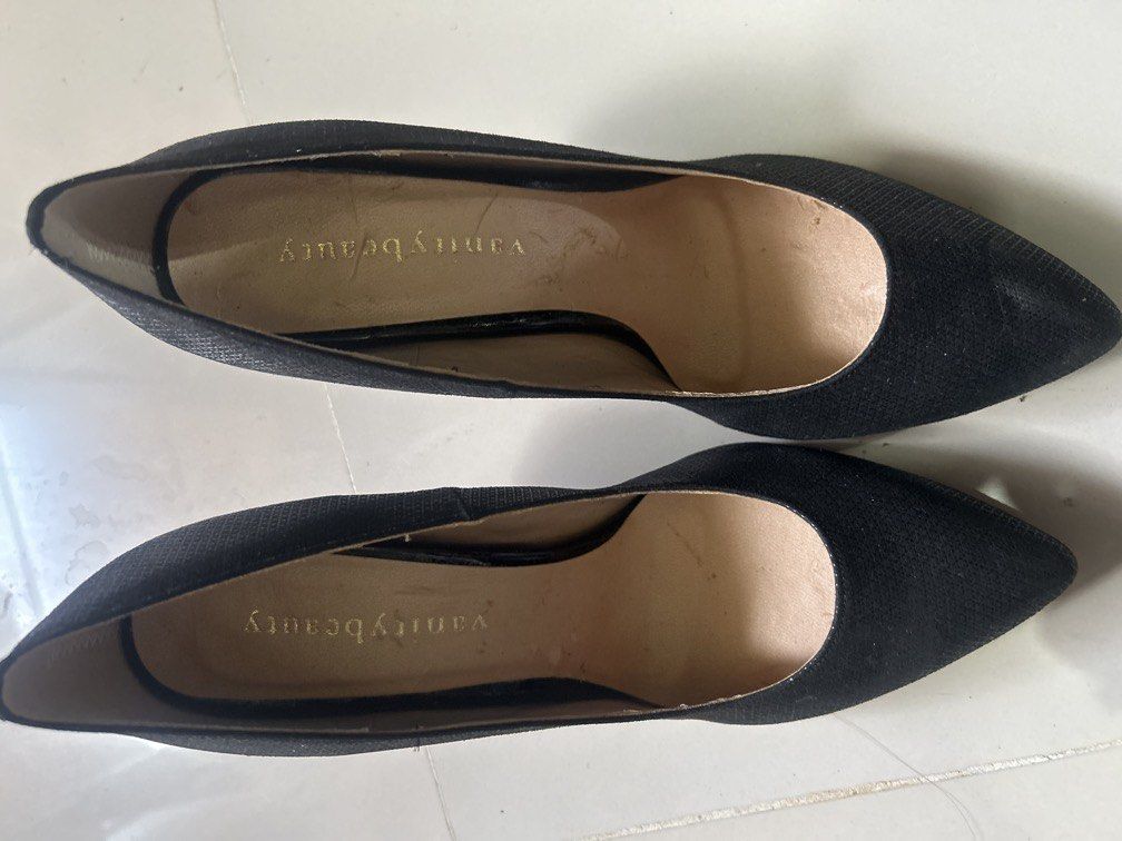 Black heels 24 .5 (Category: Heels) located in Cavite. Submitted by cecitrifthshop (Listing ID 1469625267, Image 1). Description: pair of black textured pointed-toe stiletto pumps branded with "vanity beauty" on the insole size 24.5 .