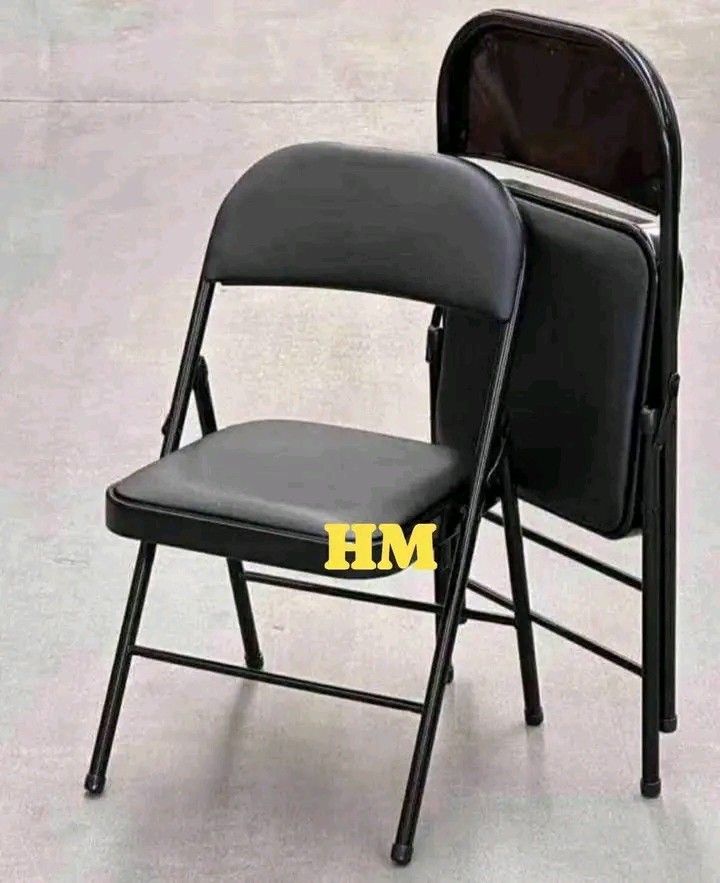 Black padded folding chairs with metal frame (Category: Chairs) located in Quezon City. Submitted by marecel146 (Listing ID 1469579979, Image 1). Description: - Color: Sleek black design suitable for any setting - Comfort: Cushioned seat and backrest for extended seating - Durability: Sturdy black metal frame with easy-to-clean surfaces - Storage: Folds flat and stackable to save space - Versatility: Ideal for parties, events, office meetings, or