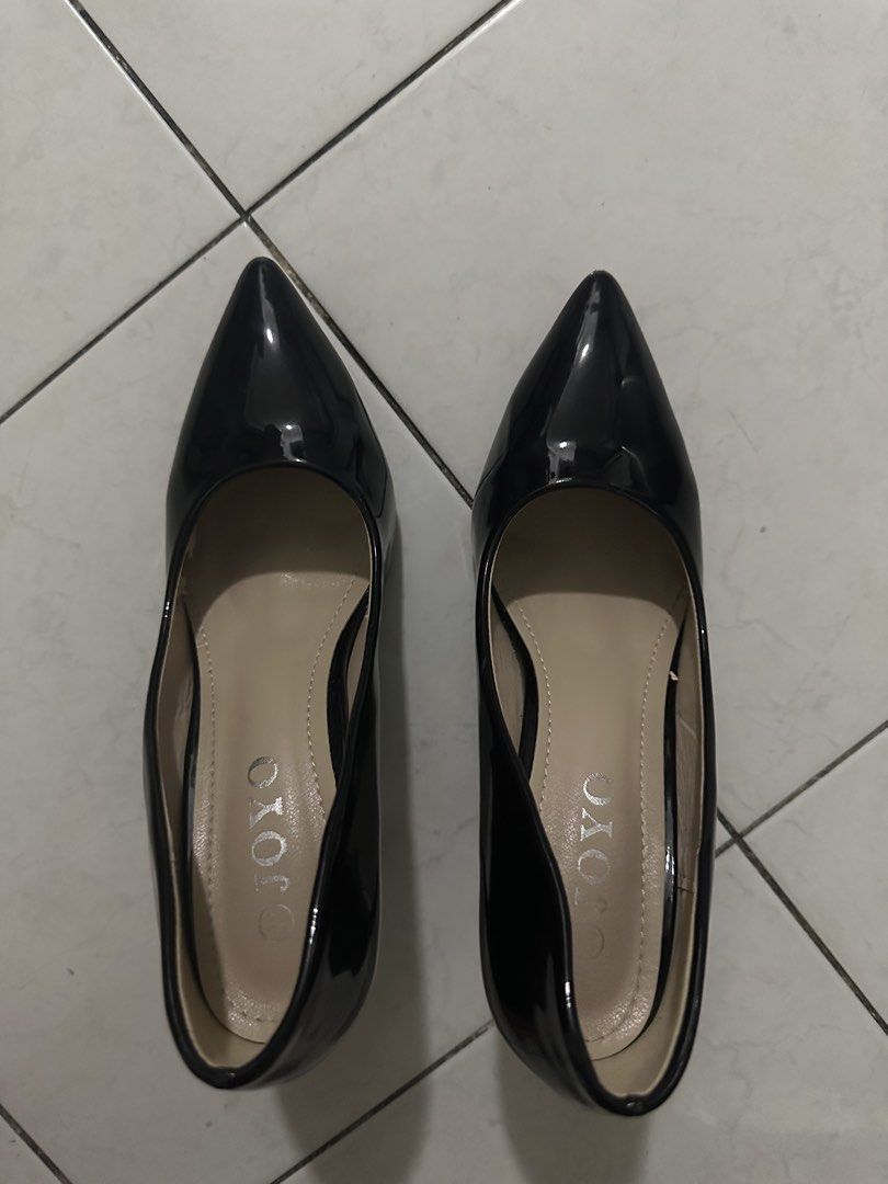 Black Patent Pointed Toe Heels (Category: Heels) located in Manila. Submitted by isabella_201013 (Listing ID 1469741017, Image 1). Description: - Brand/Model: Black patent leather pointed toe heels - Style: Classic court shoe, slip-on design with a glossy finish and beige insoles - Condition: Clean inside and out, flaking of the skin on the inside of the shoe, minimal signs of wear on the soles, and scratches - Versatility: Ideal for office wear,