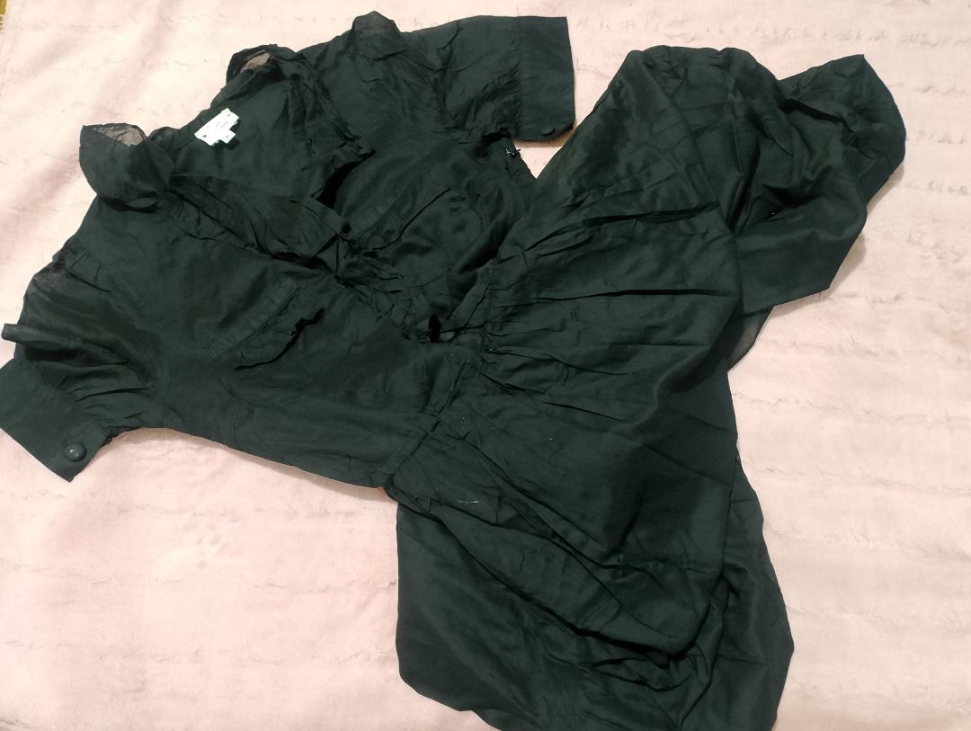 Black ruffled button-up mini dress (Category: Dresses) located in Quezon City. Submitted by ivriory.wolfie (Listing ID 1469674898, Image 1). Description: Black short-sleeve dress with buttons down the front and ruffles along the neckline. Perfect for gothic fashion Light fabric .