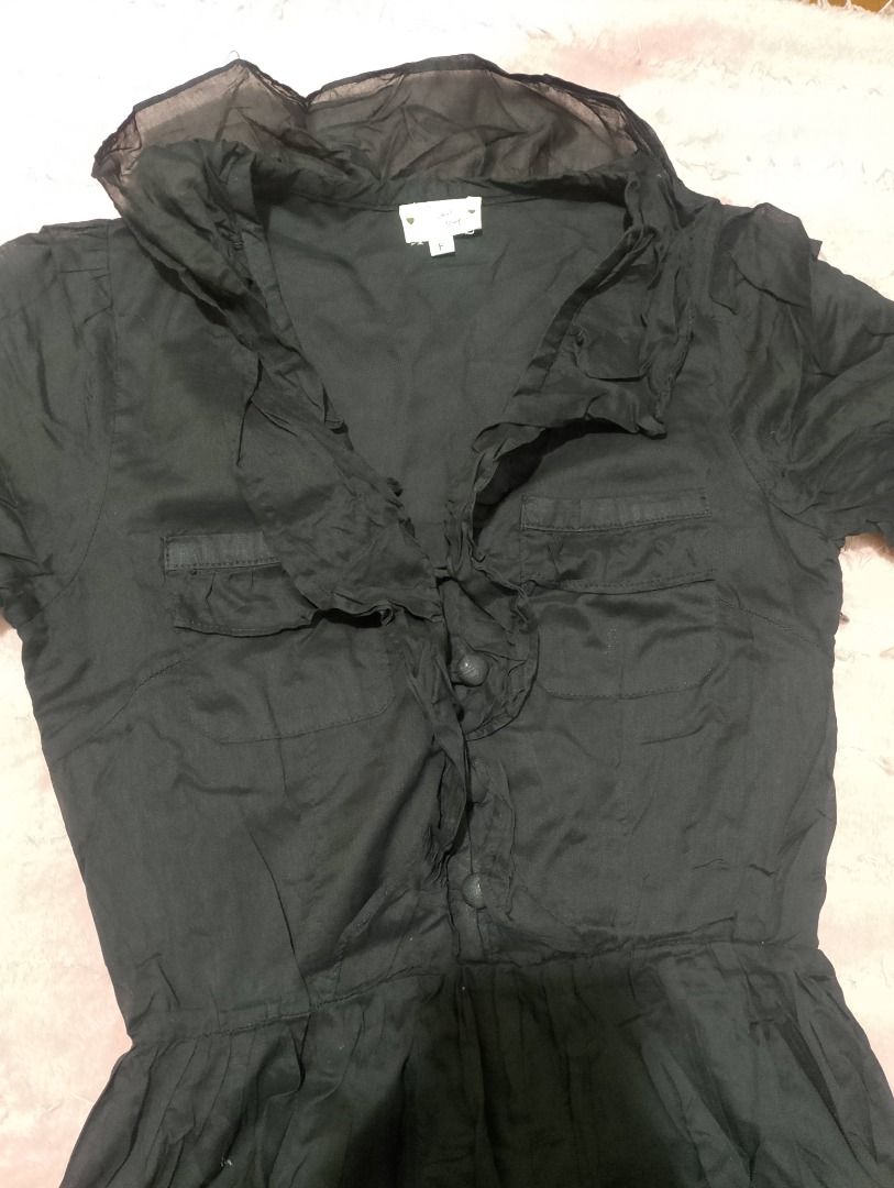 Black ruffled button-up mini dress (Category: Dresses) located in Quezon City. Submitted by ivriory.wolfie (Listing ID 1469674898, Image 3). Description: Black short-sleeve dress with buttons down the front and ruffles along the neckline. Perfect for gothic fashion Light fabric .