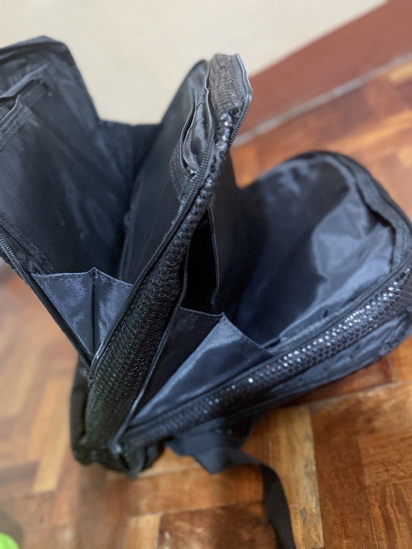 Black Sequin Backpack (Category: Backpacks) located in Manila. Submitted by only_alyssacloset (Listing ID 1469647426, Image 3). Description: Color: Black Storage: Multiple secure zippered compartments inside and out for easy organization Interior: Clean lining equipped with handy slip pockets Comfort: Padded shoulder straps featuring an adjustable chest buckle and gear loops Durability: Fitted with a sturdy top haul loop.
