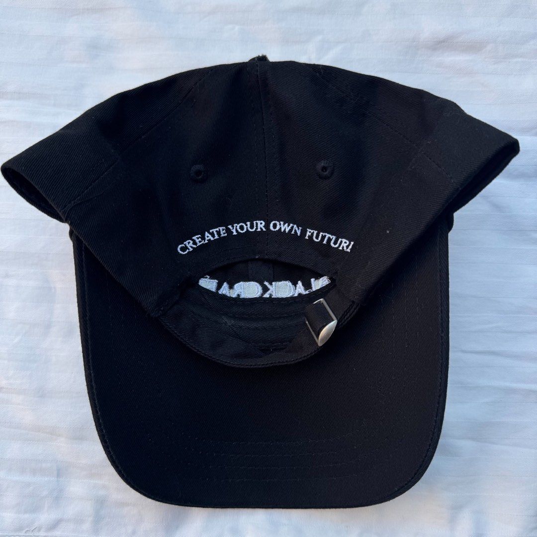 Blackcraft Cult Embroidered Black Dad Cap (Category: Caps & Hats) located in Manila. Submitted by safeowl.b6dbb0 (Listing ID 1469605836, Image 2). Description: - Brand: Blackcraft Cult - Color: Black with white embroidery - Front Design: 'BLACKCRAFT' embroidered lettering - Back Design: 'CREATE YOUR OWN FUTURI' embroidered above the strap - Fit: Classic dad hat style with a curved brim - Closure: Adjustable metal slider for a custom fit - Conditi