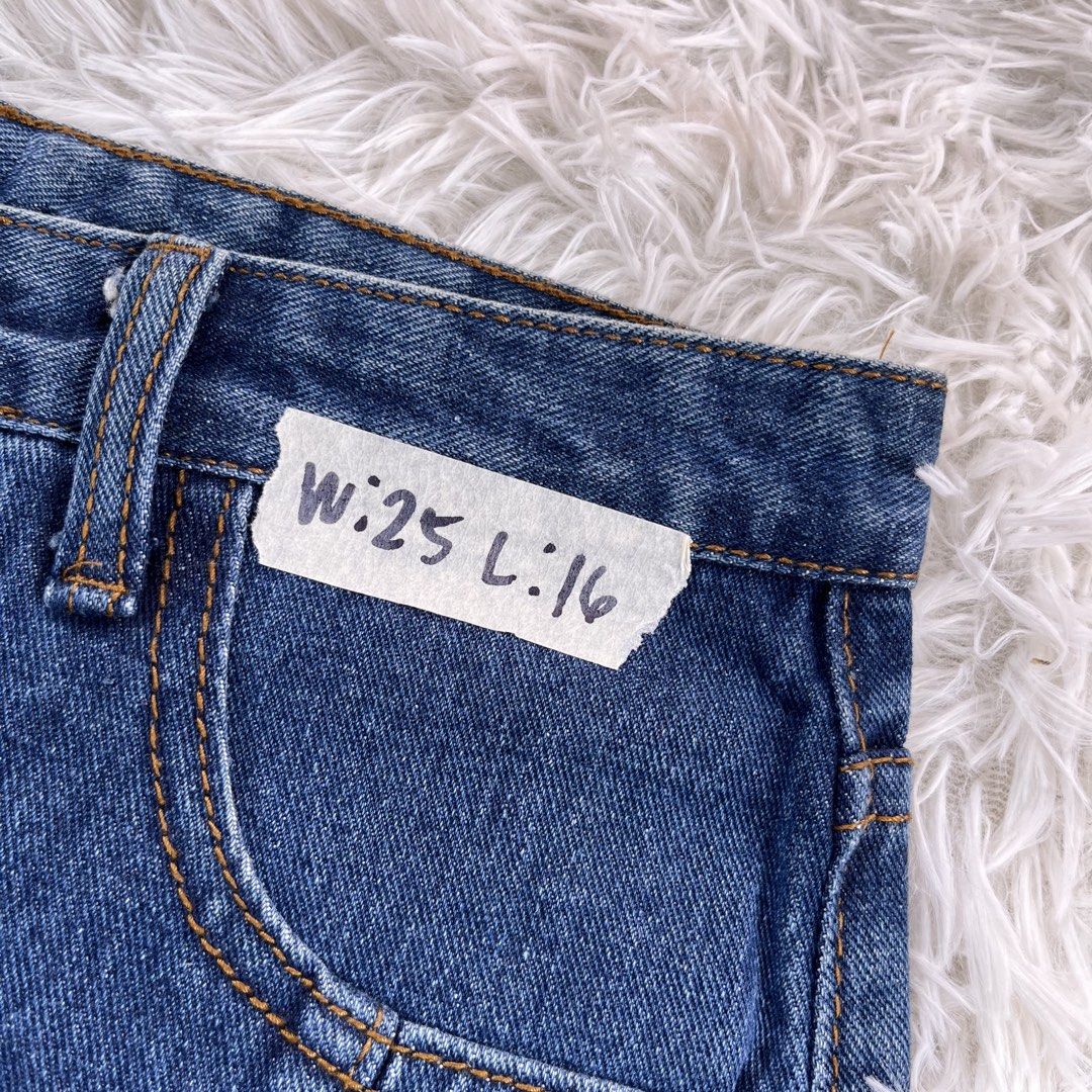 Blue Denim Button Front Mini Skirt Size 25 (Category: Skirts) located in Cuyapo. Submitted by Ashtyn.Pre.Loved (Listing ID 1469606608, Image 2). Description: - Style: Classic high-waisted blue denim mini skirt - Details: Full button-up front with contrast topstitching and functional front pockets - Size: Tagged size 25 - Length: 16 inches - Condition/Vibe: Great versatile piece, easy to style with tees, tanks, or sweaters for casual outfits.