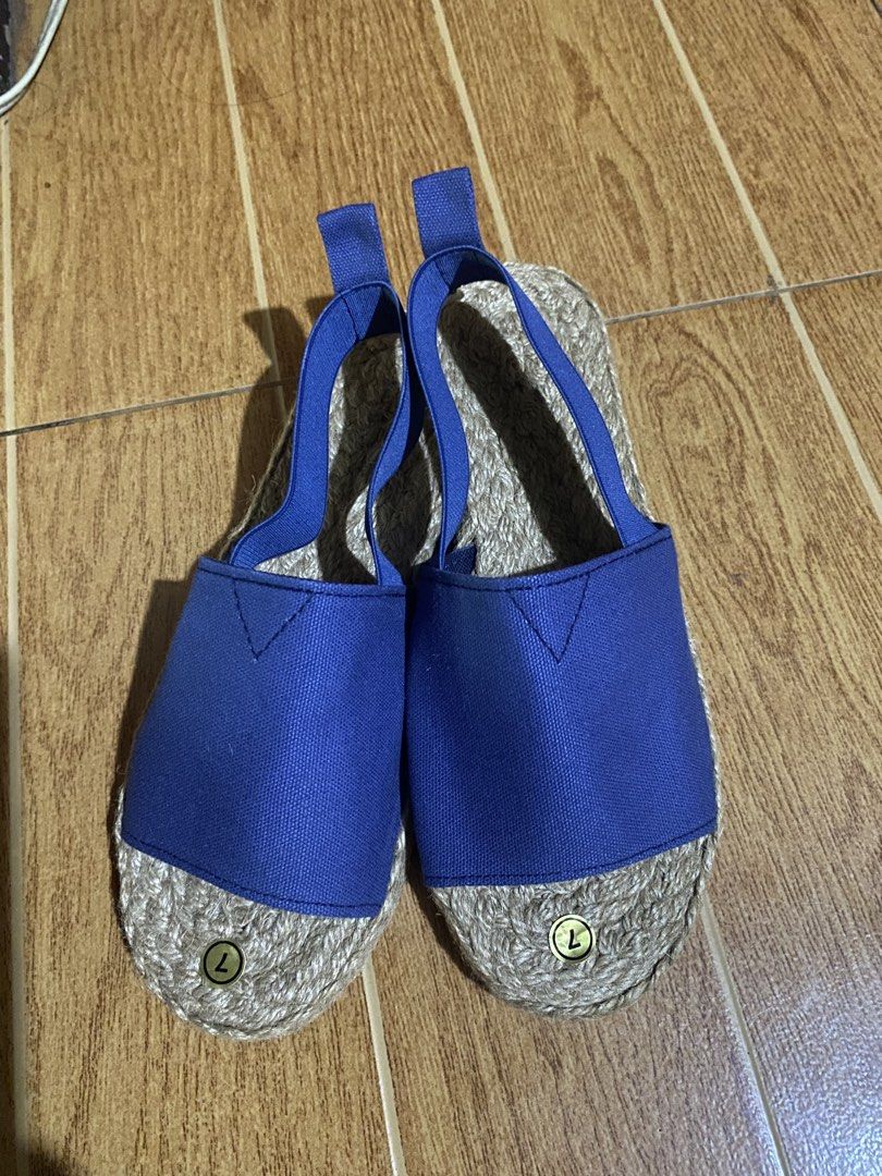 Blue Espadrille Sandals Size 7 Jute Sole (Category: Flats & Sandals) located in Paranaque City. Submitted by ilove.preloved (Listing ID 1469604553, Image 1). Description: - Style: Blue canvas espadrille sandals with slip-on design - Size: Tagged size 7 (measures approx. 24 cm in total length) - Comfort & Fit: Features a convenient back pull tab and elastic strap slingback - Material: Classic woven jute soles and durable canvas upper.