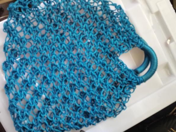 Blue Macrame Net Tote Handbag (Category: Beach Bags) located in Manila. Submitted by geminibibo (Listing ID 1469628844, Image 2). Description: Bright blue woven net handbag with sturdy wrapped handles. Handmade macrame style construction. Great casual bag for the beach, groceries, or running errands. Lightweight and easy to fold up when not in use..