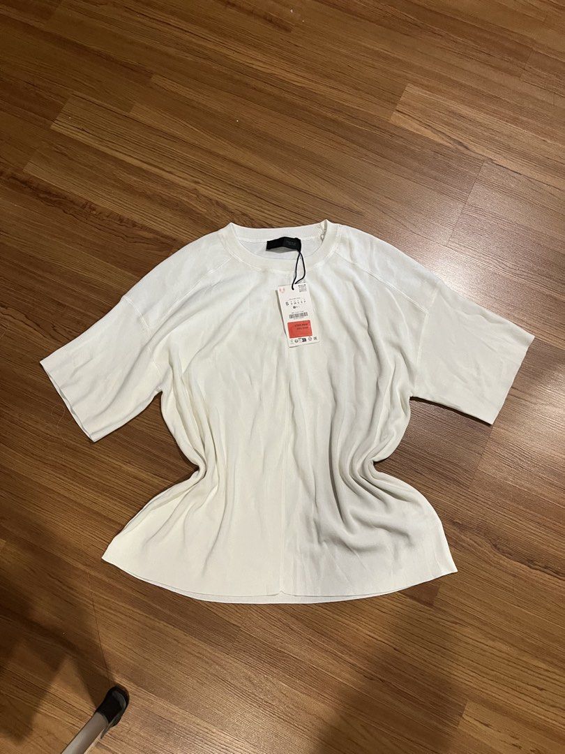 BNWT Zara Oversized Knit Shirt (Category: Shirts) located in Manila. Submitted by riri.to.you (Listing ID 1469731397, Image 3). Description: - small on tag, can fit up to medium - brand new with tags - has weight, thick knit fabric model’s height : 5’3 1/2 body frame : xs to small.