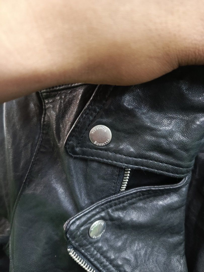 Borsetta Black Leather Biker Jacket Size 8 (Category: Coats, Jackets and Outerwear) located in Cabatuan. Submitted by penthegreat (Listing ID 1469755790, Image 3). Description: - Brand: Borsetta - Color: Classic Black - Size: 8 - Material: 100% Genuine Leather with full lining - Hardware: Heavy-duty asymmetrical YKK zippers - Design: Notched lapels with snap buttons, multiple zip pockets, and belted waist - Care: Dry clean only.
