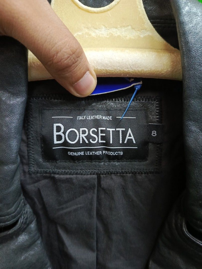 Borsetta Black Leather Biker Jacket Size 8 (Category: Coats, Jackets and Outerwear) located in Cabatuan. Submitted by penthegreat (Listing ID 1469755790, Image 2). Description: - Brand: Borsetta - Color: Classic Black - Size: 8 - Material: 100% Genuine Leather with full lining - Hardware: Heavy-duty asymmetrical YKK zippers - Design: Notched lapels with snap buttons, multiple zip pockets, and belted waist - Care: Dry clean only.