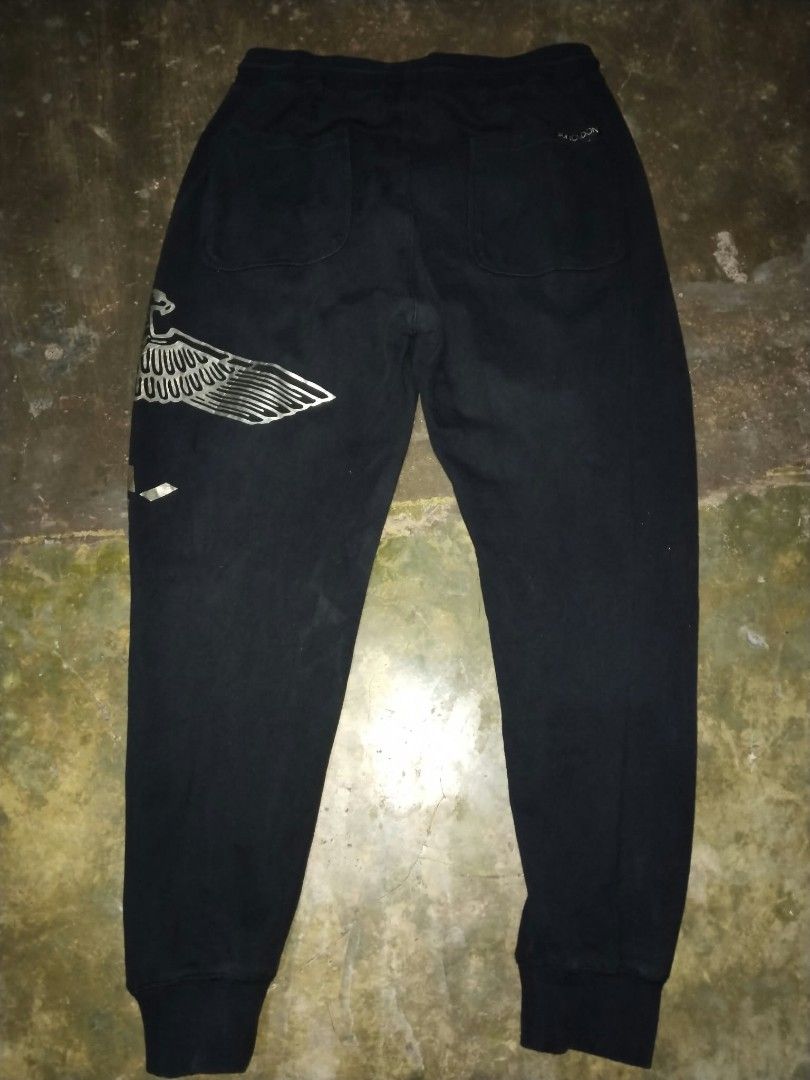 Boy London Black Jogger (Category: Activewear) located in Cavite. Submitted by adynnej.various.items (Listing ID 1469681056, Image 2). Description: featuring a metallic silver eagle logo and branding. Color Rate: 9/10.