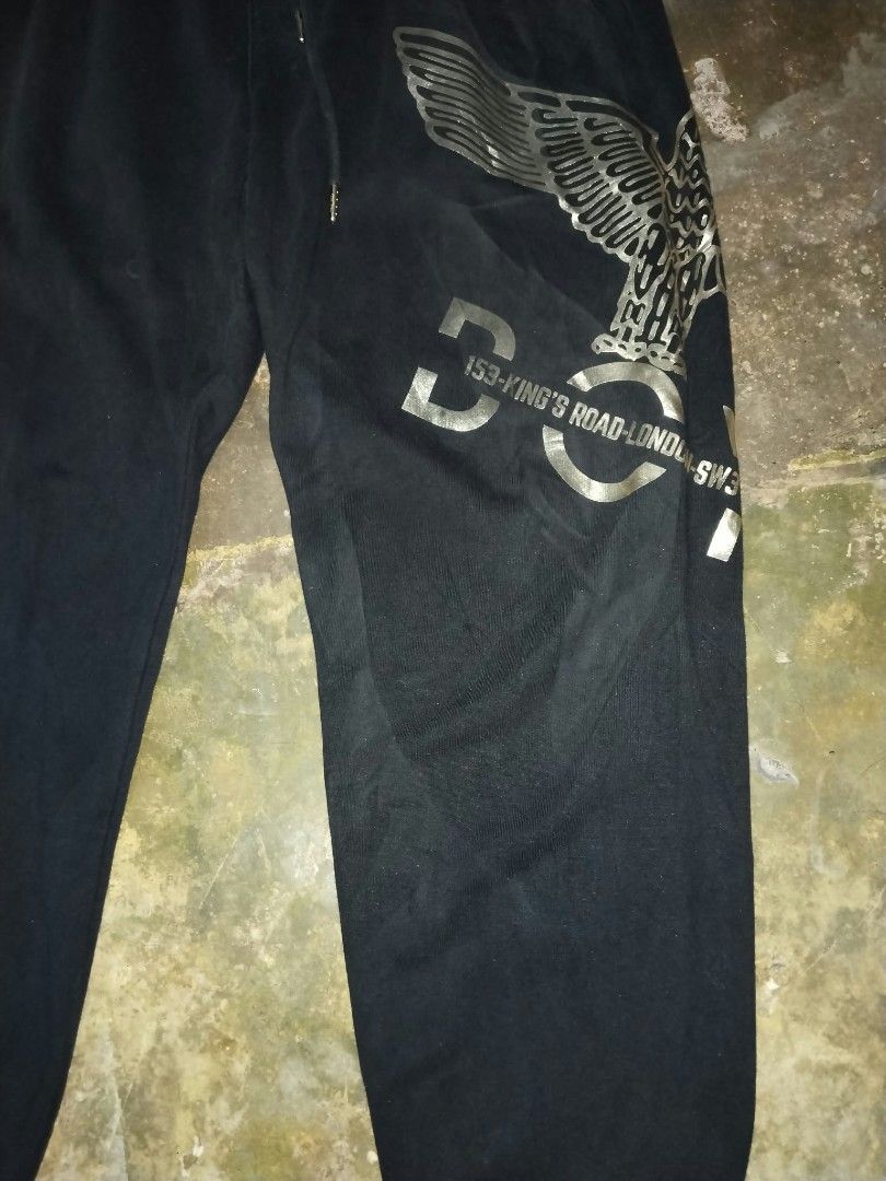 Boy London Black Jogger (Category: Activewear) located in Cavite. Submitted by adynnej.various.items (Listing ID 1469681056, Image 3). Description: featuring a metallic silver eagle logo and branding. Color Rate: 9/10.