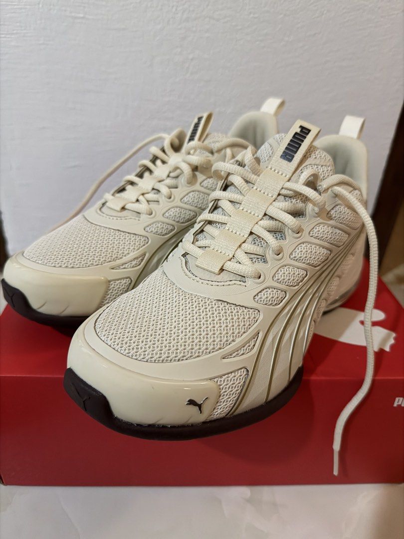 Brand New Puma Voltra 2026 (Category: Sneakers) located in Tuguegarao City. Submitted by jesdj (Listing ID 1469658145, Image 1). Description: PUMA Voltra Sneakers in the “Warm White / Alpine Snow / PUMA Gold” colorway - Design: Trendy chunky silhouette with breathable mesh upper and synthetic overlays - Comfort: Visible X-Cell tech cushioning in the heel for extra support - Inclusion: Comes with the original red Puma shoebox - Condition: Brand ne