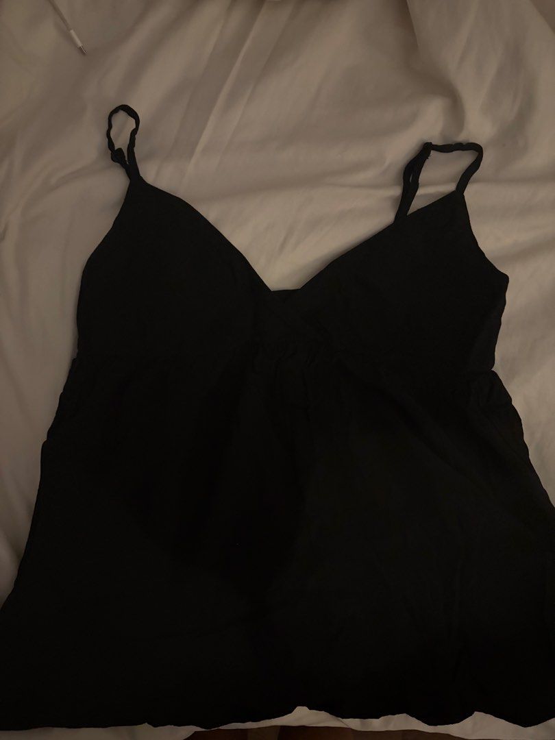 Brandy Melville John Galt Edith Tank Black (Category: Sleeveless) located in Paranaque City. Submitted by consumptionqueen18 (Listing ID 1469699546, Image 2). Description: rfs : i dont suit plunging tops.