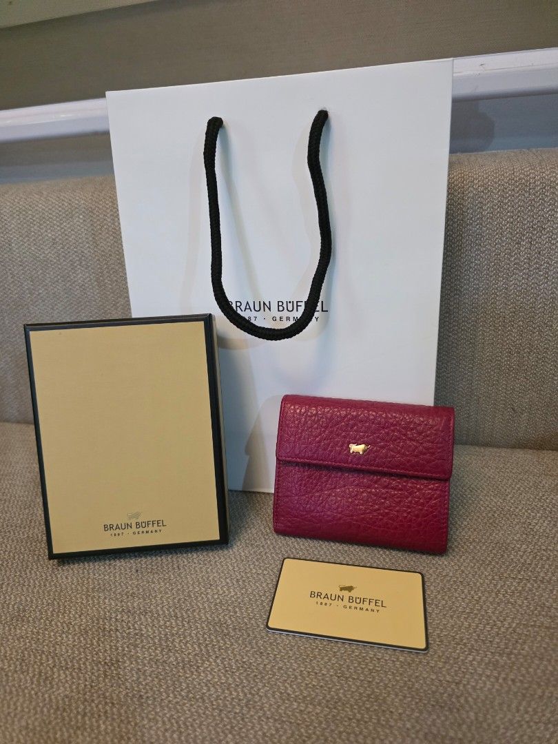 Braun Buffel Wallet (Category: Luxury Bags & Wallets) located in Pasig City. Submitted by starfjames (Listing ID 1469652055, Image 1). Description: Pre-loved authentic Braun Buffel wallet for a very good price! Bought in Singapore. Very nice, soft luxurious leather, great condition (like new), used only a few times. 12 card slots, 1 window ID slot,1 button coin compartment, bill compartment with divider, 1 exterior slip pocket. Approx. dimensions