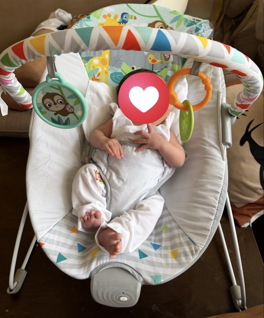 Bright Starts Safari Fun Vibrating Bouncer (Category: Infant Playtime) located in Taguig. Submitted by malditalovespurple (Listing ID 1469654903, Image 3). Description: - Brand: Bright Starts (Safari Fun Vibrating Bouncer) - Condition: Original box included - Features: Soothing vibration mode to calm baby - Comfort: Cradling seat design for extra support - Toys: Removable toy bar with 2 attached toys - Safety: Adjustable 3-point harness - Mainten