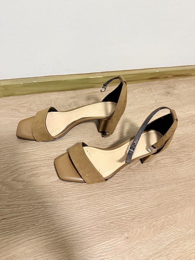 Brown Block Heel Sandals Ankle Strap Size S (Category: Heels) located in Manila. Submitted by thrift_pque (Listing ID 1469699815, Image 2). Description: - Style: Classic brown block heel sandals with square toe and adjustable ankle strap - Material: Suede-like texture on front strap and heel - Comfort: Low, wearable block heel height - Versatility: Neutral earth tone that easily matches casual or work outfits - Details: Size S, made in Vietnam - 