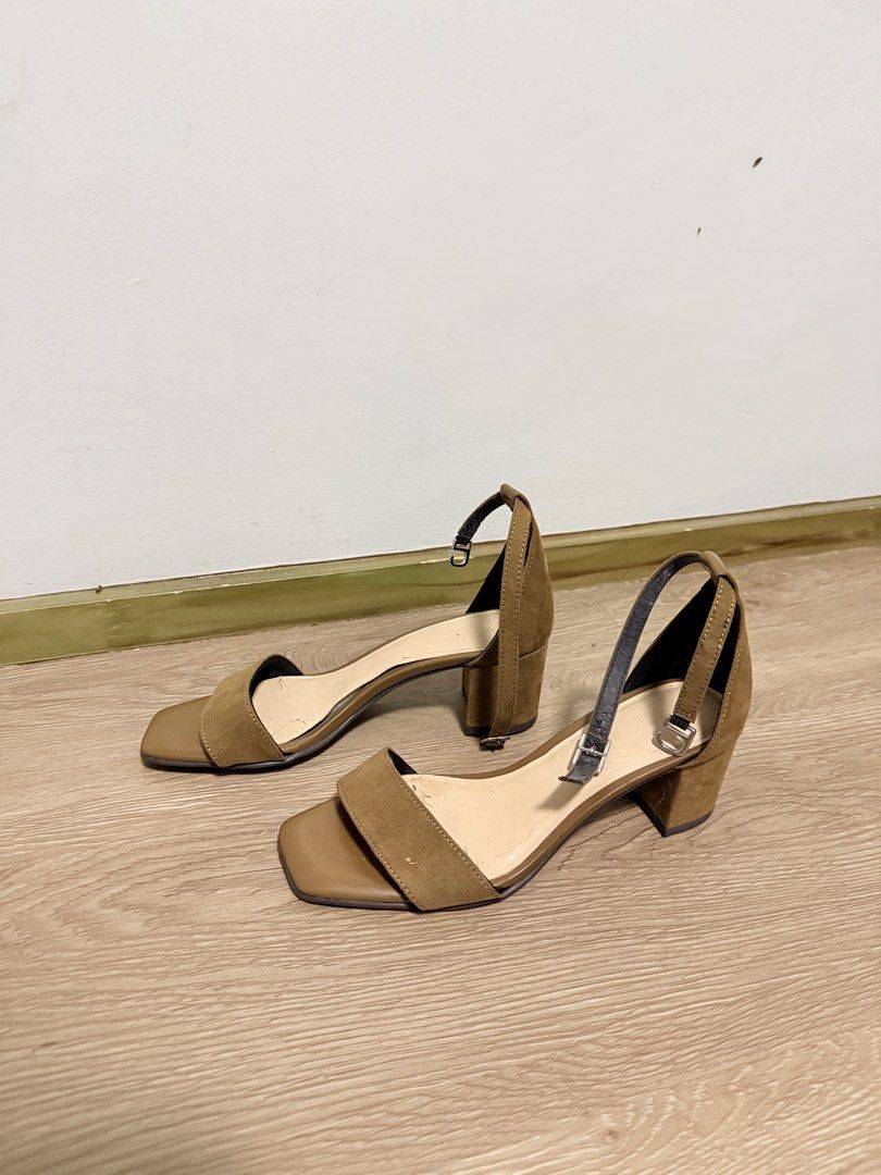 Brown Block Heel Sandals Ankle Strap Size S (Category: Heels) located in Manila. Submitted by thrift_pque (Listing ID 1469699815, Image 1). Description: - Style: Classic brown block heel sandals with square toe and adjustable ankle strap - Material: Suede-like texture on front strap and heel - Comfort: Low, wearable block heel height - Versatility: Neutral earth tone that easily matches casual or work outfits - Details: Size S, made in Vietnam - 