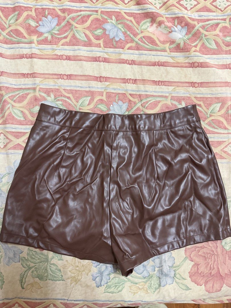 Brown Leather Shorts (Category: Shorts) located in Manila. Submitted by tltdeclutters (Listing ID 1469738432, Image 2). Description: - Never worn as it’s too big on me - Brand new - Currently ₱302 on Shein so I’m selling for ₱280! - Can do same day delivery.