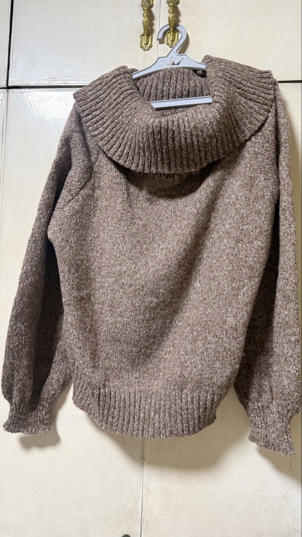 Brown Off-Shoulder Knit Sweater Large (Category: Longsleeves) located in Makati City. Submitted by mbcab (Listing ID 1469689958, Image 1). Description: - Brand: SHEIN - Size: Large - Style: Off-shoulder knit sweater - Color: Warm brown (soft heathered yarn) - Details: Wide folded collar, long balloon sleeves, ribbed cuffs and hem - Condition: Brand new / Excellent - Perfect cozy piece for the cooler weather or commute!.