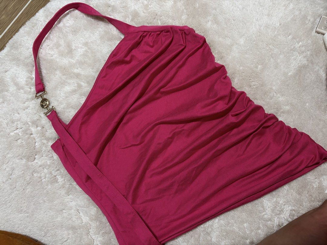 BSCO Orion top Size Large (Category: Sleeveless) located in Mandaluyong City. Submitted by sckyomiii (Listing ID 1469586541, Image 1). Description: - Brand: BSCO - Style: Halter neck top with chic gold-tone hardware clasp - Design: Trendy all-over ruching in a vibrant magenta/pink hue - Material: Soft and stretchy fabric for a comfortable fit - Condition: Great, clean, and ready to wear.