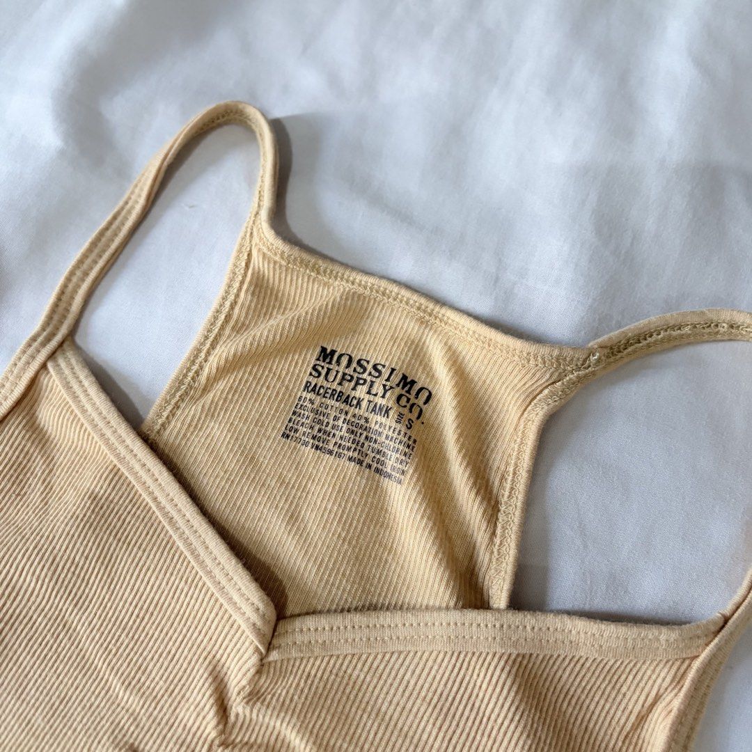 BUNDLE: 3 Basic Tank Tops (Category: Sleeveless) located in Quezon City. Submitted by angelajuliet__ (Listing ID 1469620481, Image 2). Description: - 35 each if per item - Bundle of 3 versatile women's tank tops - Size: Small - Includes: Beige Mossimo ribbed racerback, blue Old Navy lace-trim cami, and dark grey athletic tank - Great for layering or solo wear on warm days - Condition: Excellent basics - DM for fast transaction and shipping option