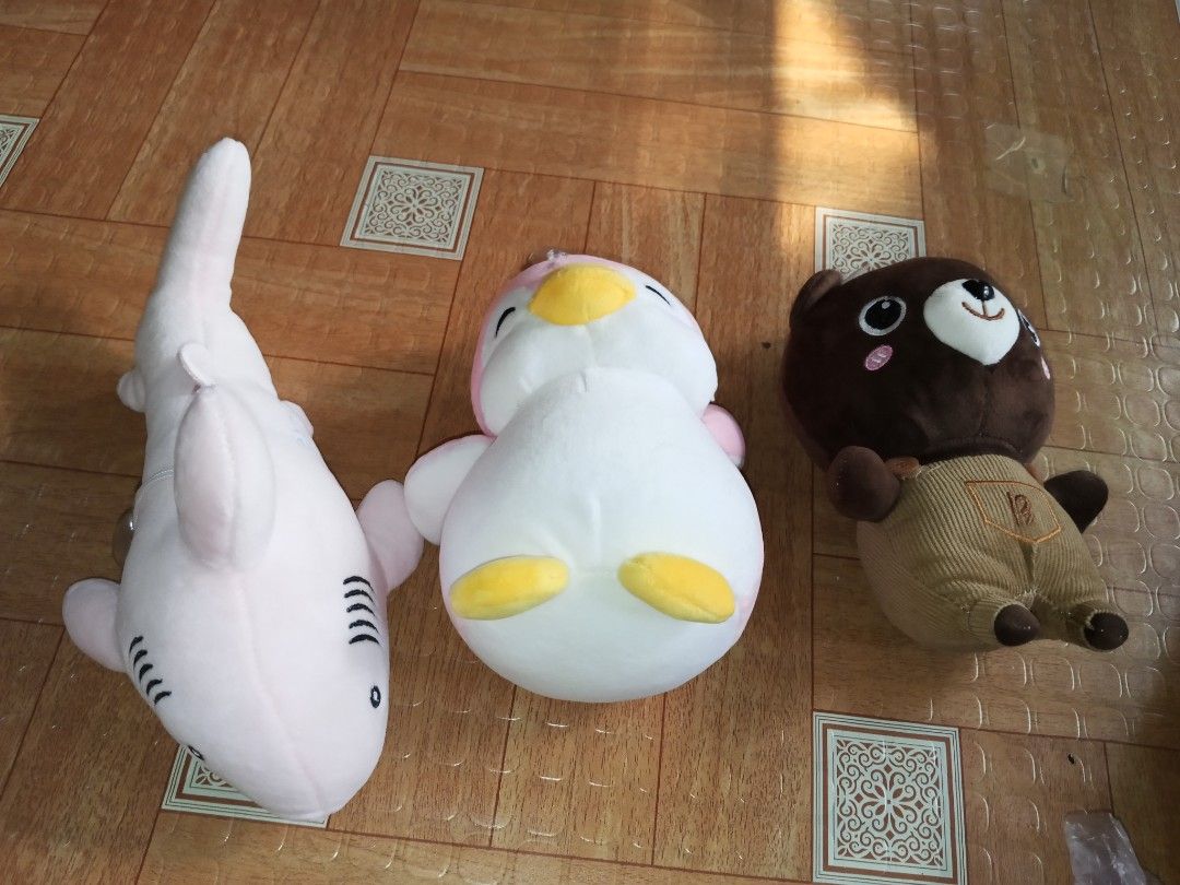 Bundle 3 Small Plush Toy Stuffed (Category: Plushies & Soft Toys) located in Navotas City. Submitted by vanilla_sandalwood (Listing ID 1469689527, Image 1). Description: -No Brand -Brown Bear -Penguin Mallow Type -Shark Mallow Type -like nEw -Good condition.