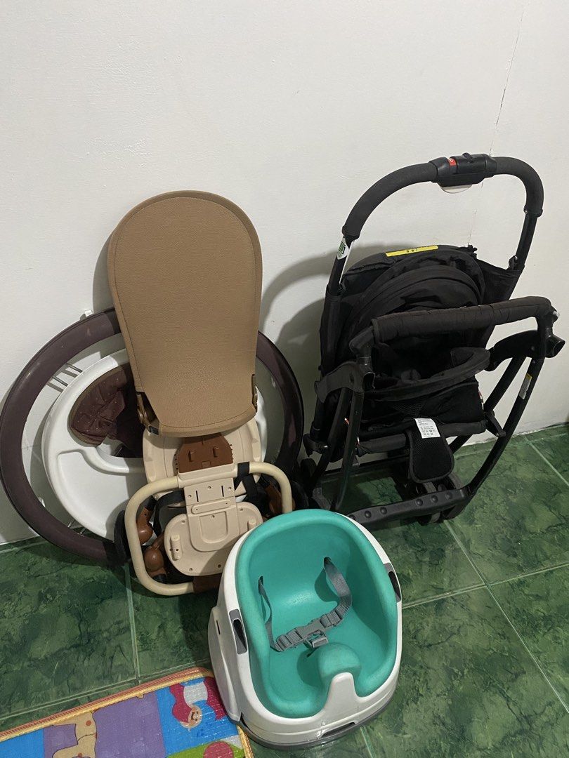 BUNDLE Baby stroller, high chair, walker and floor seat bundle (Category: Strollers) located in Caloocan City. Submitted by saharalim88430 (Listing ID 1469734592, Image 2). Description: - All-in-one baby gear bundle: Perfect starter set for new parents - Black foldable stroller with canopy for daily walks and travel - Brown circular baby walker with a comfortable seat - Turquoise floor seat equipped with a secure harness - Beige high chair for ea