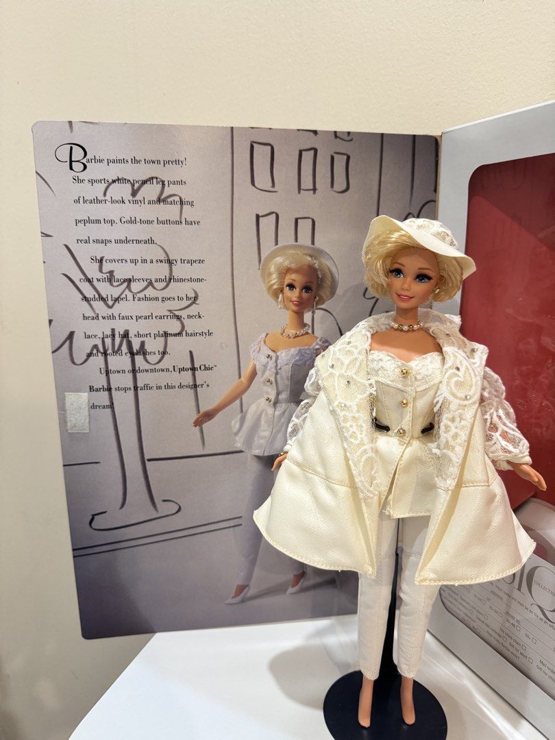 Bundle Barbie for 4k only from 6k (Category: Kids Toys) located in Manila. Submitted by coolwolf_7ee5a0 (Listing ID 1469669680, Image 3). Description: - Mattel Classique Collection Third Series doll featuring a chic white outfit and hat - American Beauties Army Barbie in a stunning military evening uniform with jacket, skirt, and hat - Includes the original packaging for both dolls. Display stands are available for an additional fee. - Excellent 