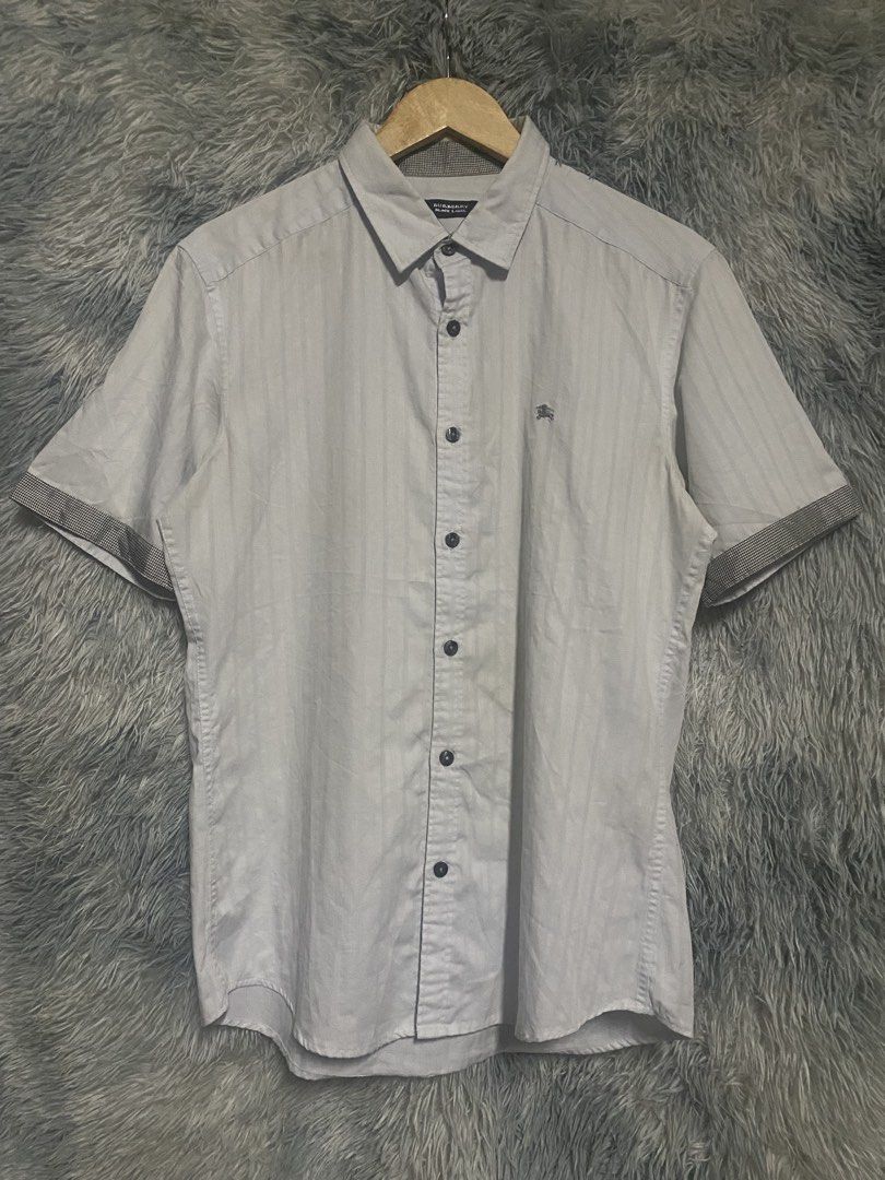 BURBERRY BLACK LABEL BUTTONDOWN (Category: Formal Shirts) located in Cavite. Submitted by lwrnc.444 (Listing ID 1469610677, Image 1). Description: BURBERRY BLACK LABEL BUTTONDOWN COMPLETE TAGS GOOD CONDITION 🏷️849 FREE SHIP DIMES WIDTH 21.5 LENGTH 28.5 DASMARIÑAS CAVITE LOC .