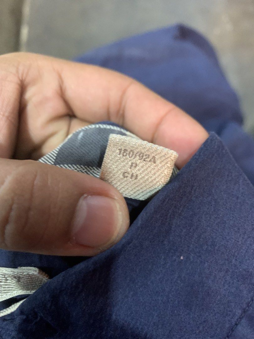 Burberry Brit Dark Blue Long Sleeve Button-Down Shirt (Category: Luxury Apparel) located in Cagayan de Oro. Submitted by agboysalis60090 (Listing ID 1469711547, Image 3). Description: Dark blue long sleeve button-down shirt from Burberry Brit. Size small, 160/92A. 100 percent cotton fabric. Made in Hong Kong. Classic button-front design with collared neck. Machine washable per care tag instructions. Clean condition with standard wear..