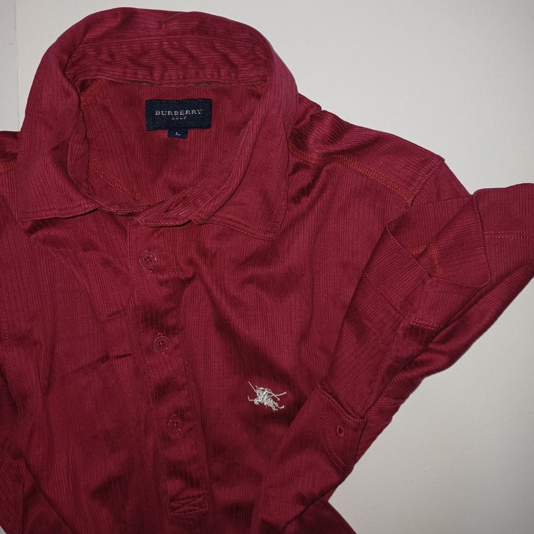 Burberry Golf Maroon Polo Shirt (Category: Tshirts & Polo Shirts ) located in Pasig City. Submitted by padillaaub64242 (Listing ID 1469656384, Image 2). Description: -Burberry Golf Maroon Polo Shirt - Size on Large - 21×27 Inches .