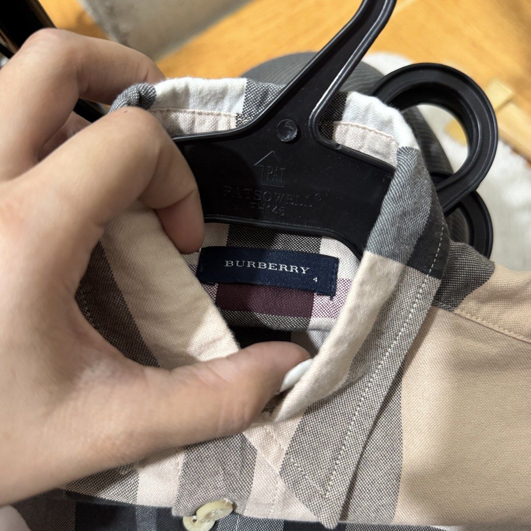 BURBERRY kids plaid polo (Category: Babies & Kids Fashion) located in Valenzuela. Submitted by thriftynanay88 (Listing ID 1469651120, Image 2). Description: Size 4Y on tag.