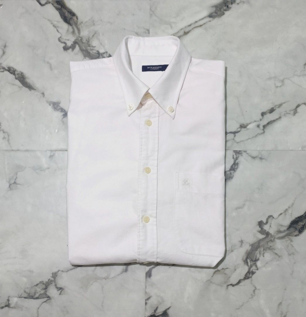 Burberry Polo Buttons Down (Category: Luxury Apparel) located in Bacolod City. Submitted by luxtrend.ph (Listing ID 1469613536, Image 2). Description: BURB€RRY POLO BUTTONS DOWN •Photos may vary due to lighting✨ •For Men •Size: Medium - Semi Large •Measurements: 20 W / 28,29 L •Condition: Excellent •Issues: None •Color Rate: 9.5/10 •Complete tags •Embroid logo designs •₱rice: 1,880🏷 DM to purchase🛒🛒🛒 Courier: J&T Express MOP: Gcash / Bank Tra