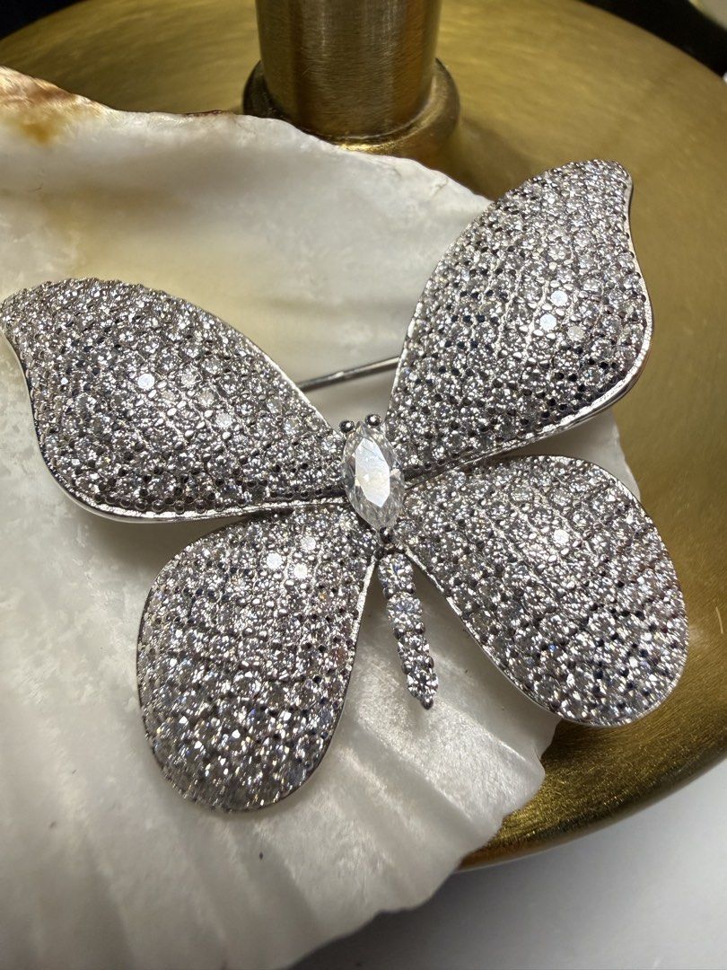 Butterfly Brooch - Moissanite (Category: Brooches) located in Baguio. Submitted by mooi.kuryba (Listing ID 1469720215, Image 2). Description: Transform your look with our stunning D Color Moissanite Butterfly Brooch! ✨ Crafted with sparkling D Color moissanites, this elegant butterfly design adds a touch of luxury and charm to any outfit. Perfect for formal occasions or to elevate your everyday style. Brilliant sparkle, timeless elegance 💎 Delic