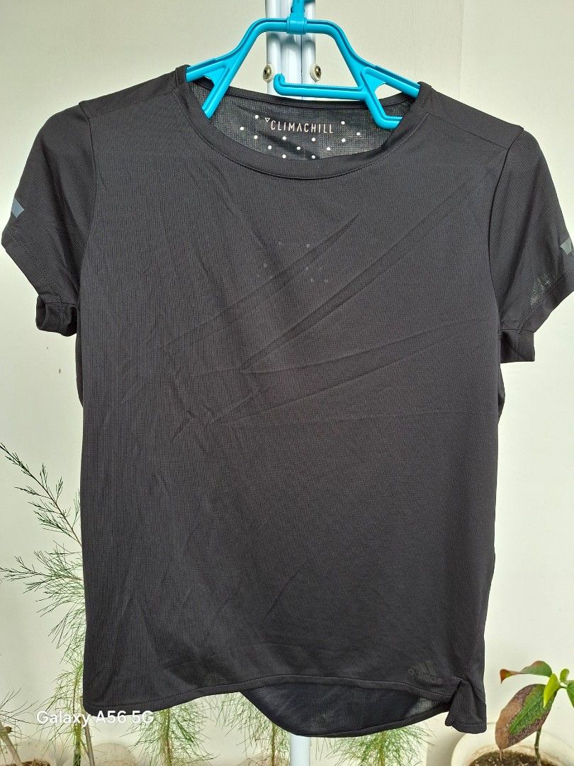 BUY 1 GET 1, ₱399 for both! (Category: Activewear) located in Tuguegarao City. Submitted by little_toto (Listing ID 1469594084, Image 1). Description: Please read carefully! Factory old stock, 2 tops: 🖤 Adidas ClimaChill top (black), size L Lightweight, breathable mesh fabric with a perforated back and reflective 3-stripe print. Cooling tech made for running and workouts. 🤍 White sports tee, mother and child with heart balloons print, tag size 