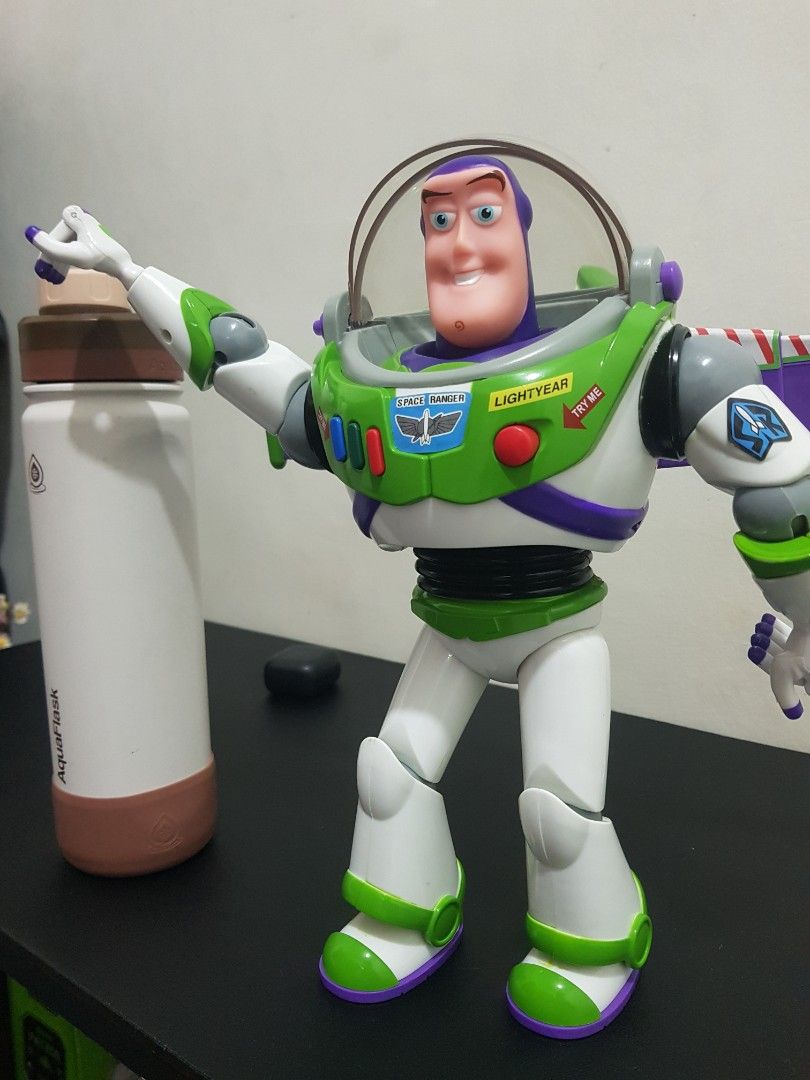 Buzz Lightyear Toy Story Action Figure (Category: Figurines & Statues) located in Angeles City. Submitted by slim.chano98 (Listing ID 1469702556, Image 1). Description: - Authentic Buzz Lightyear action figure Talking - Iconic green, white, and purple space ranger suit - Movable arms and joints for fun posing - Retractable clear helmet dome - Clean condition, ready for display or play - Great gift for kids and collectors -Lights and Voice are wor