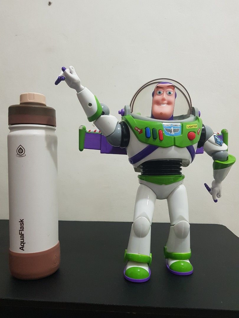 Buzz Lightyear Toy Story Action Figure (Category: Figurines & Statues) located in Angeles City. Submitted by slim.chano98 (Listing ID 1469702556, Image 2). Description: - Authentic Buzz Lightyear action figure Talking - Iconic green, white, and purple space ranger suit - Movable arms and joints for fun posing - Retractable clear helmet dome - Clean condition, ready for display or play - Great gift for kids and collectors -Lights and Voice are wor
