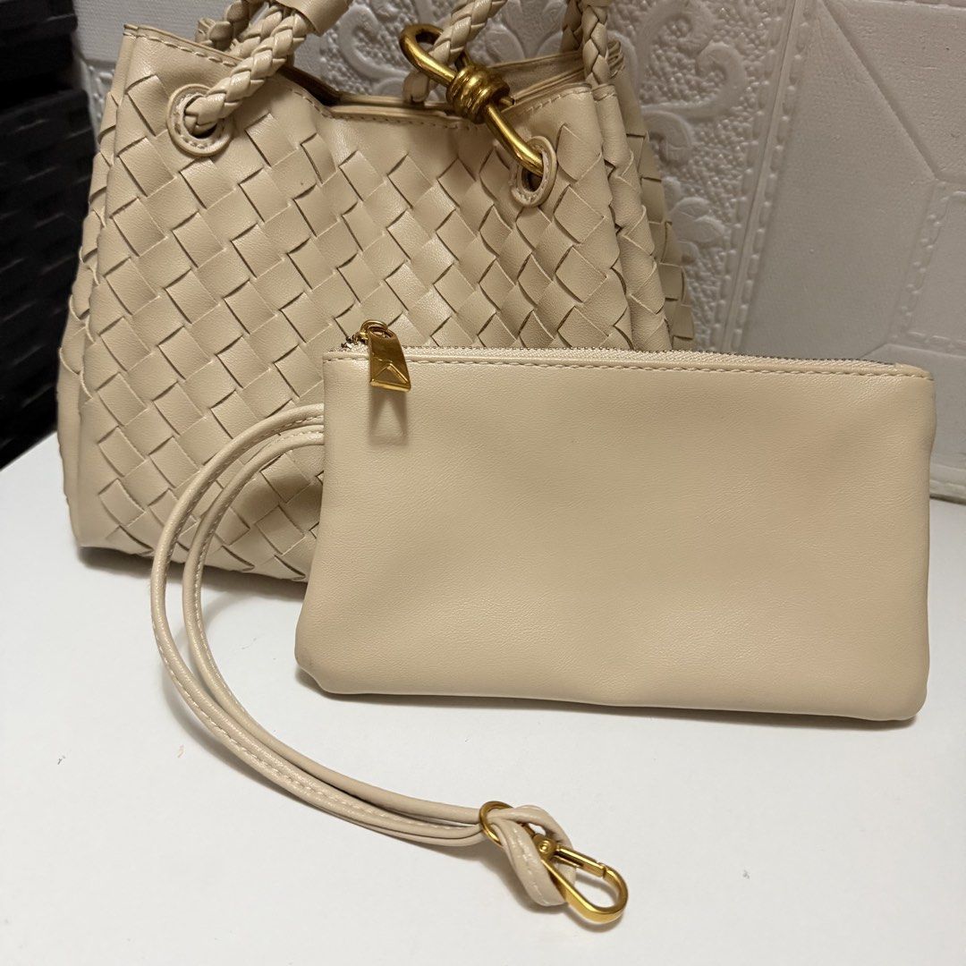 BV Parachute Inspired only (Category: Shoulder Bags) located in Davao. Submitted by tingz444less (Listing ID 1469753439, Image 2). Description: - Style: Classic intrecciato woven pattern in a versatile cream shade - Material: Premium leather with clean exterior and interior, no scuffs or marks - Hardware: Elegant gold-tone accents - Straps: Comfortable braided shoulder straps - Bonus: Includes a matching zippered pouch with a wrist strap - Condit