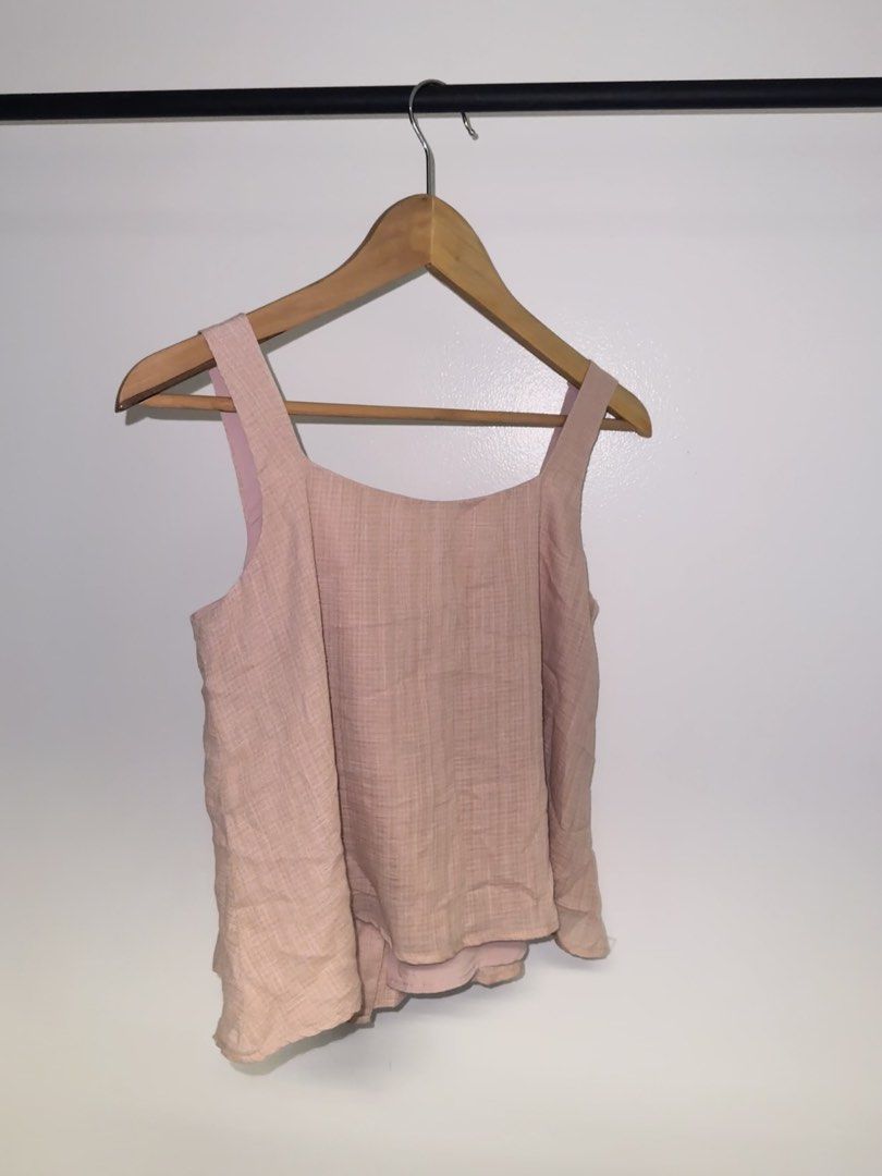 Calli Pink Top (Category: Sleeveless) located in Quezon City. Submitted by coolmomma (Listing ID 1469732214, Image 3). Description: Good condition Length 21 in. fits small to medium .