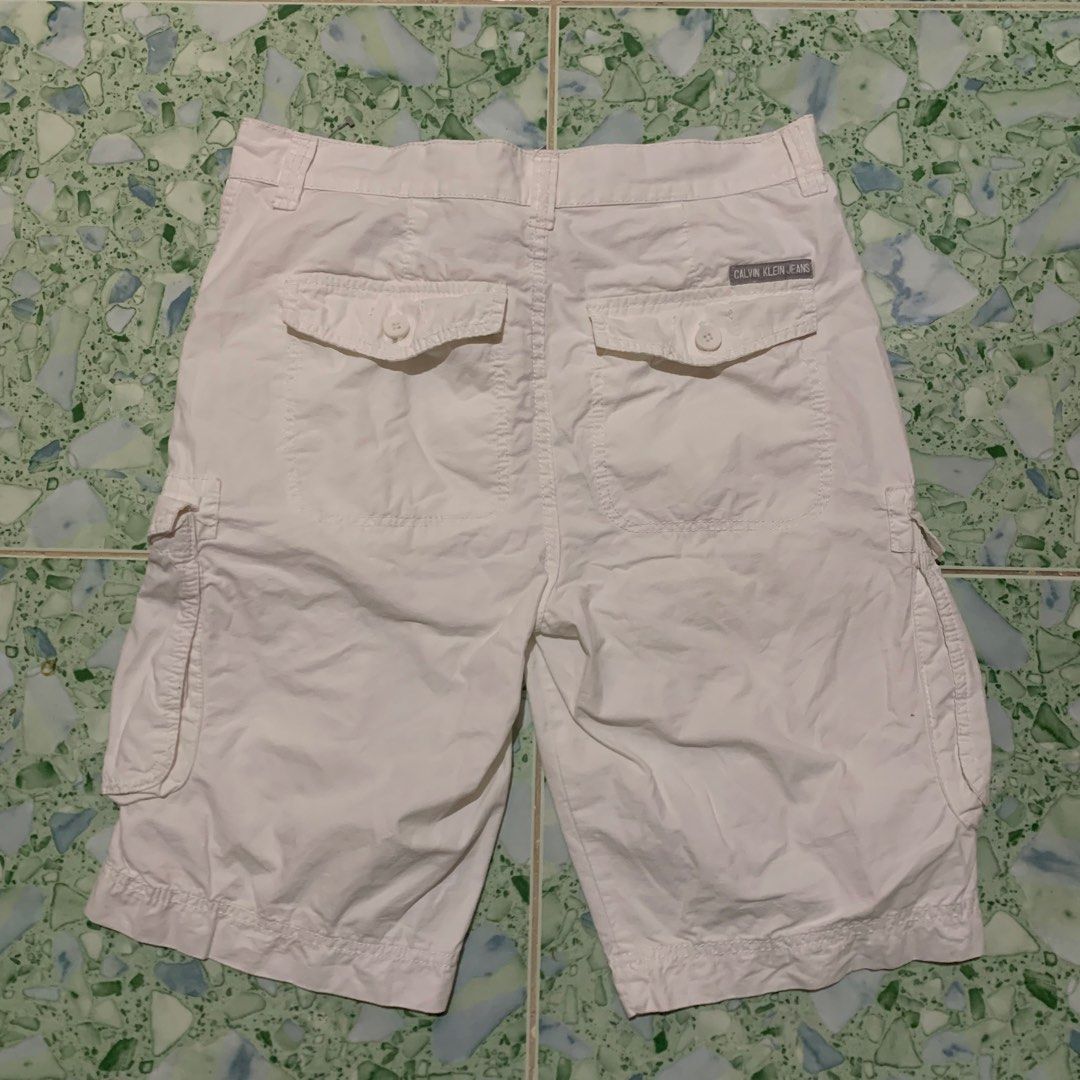 Calvin Klein Cargo Shorts (Category: Shorts) located in Dalaguete. Submitted by offrack.ph (Listing ID 1469713078, Image 3). Description: ❗️FOR SALE Calvin Klein Cargo Shorts WAIST 30 ON TAG LENGTH 22 LEGHOLE 9.5 COLOR RATE 10/10 GOOD CONDITION ISSUE: BROKEN BUTTON CAN SHIP VIA J&T✈️ 📩.