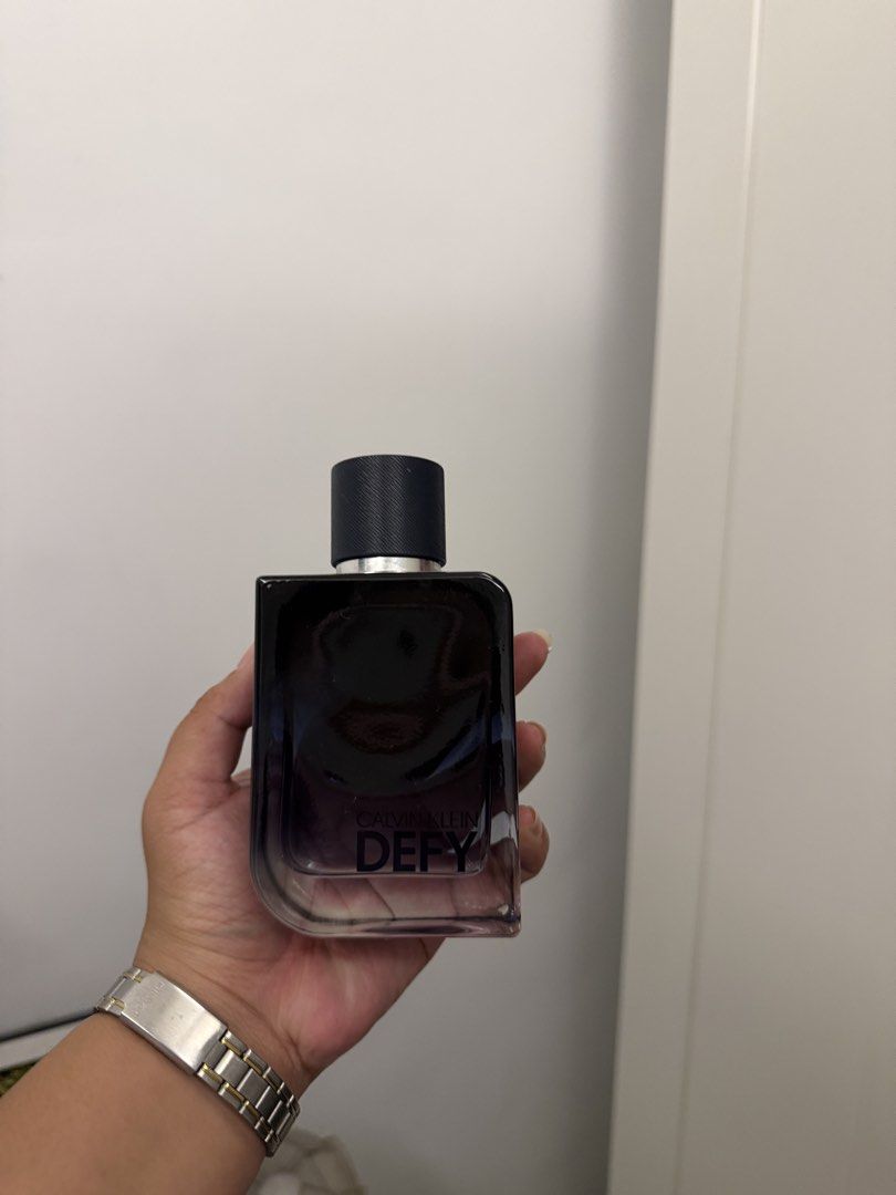 Calvin Klein Defy EDP (Category: Fragrance & Deodorants) located in Cainta. Submitted by lovecalluengg (Listing ID 1469599181, Image 1). Description: Calvin Klein Defy Eau de Parfum (EDP) 100ml bottle (dark gradient glass with textured black cap) No box 98% left Rfs: Decluttering .